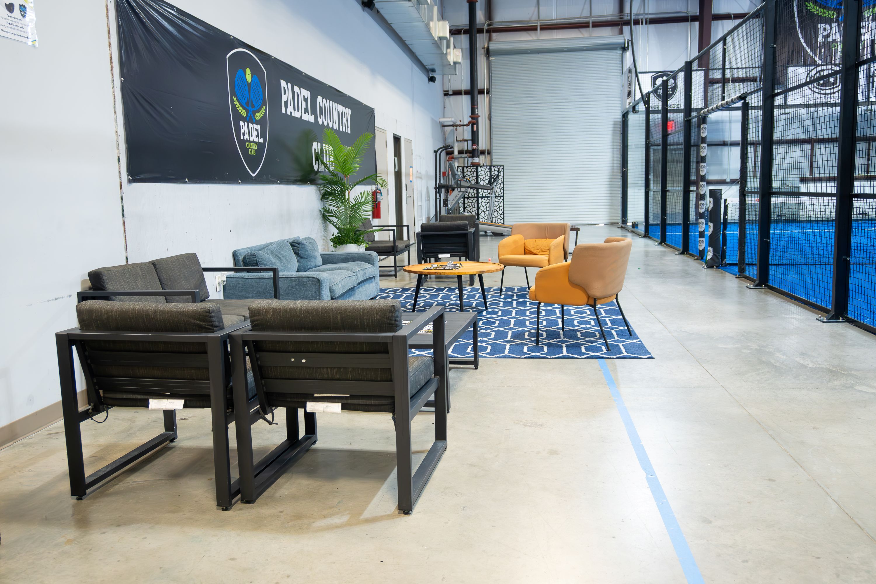 Indoor lounge area at Padel Country Club